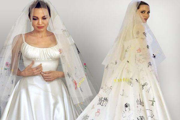 Рисунки детей были вышиты на платье